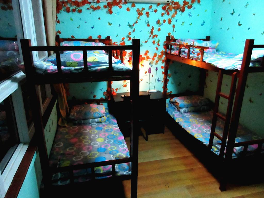 25°C Four Season Youth Hostel Qingdao Kamer foto