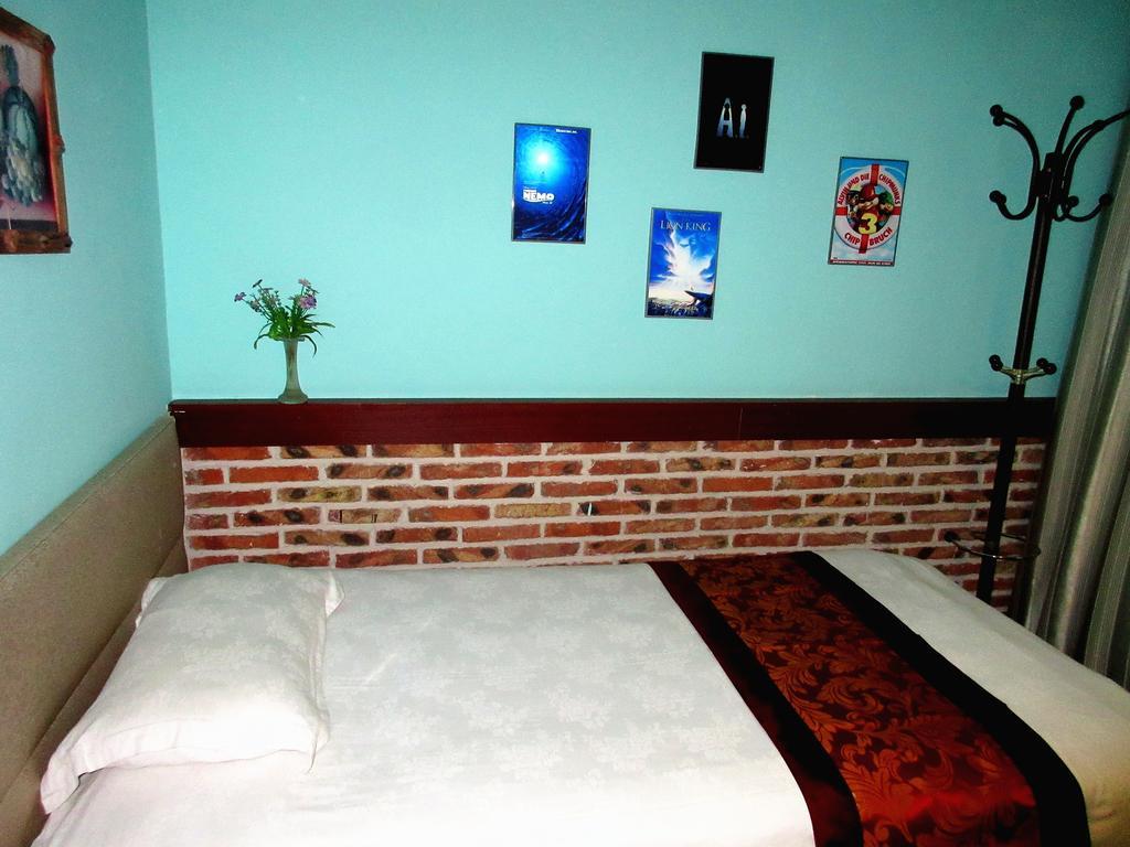 25°C Four Season Youth Hostel Qingdao Kamer foto