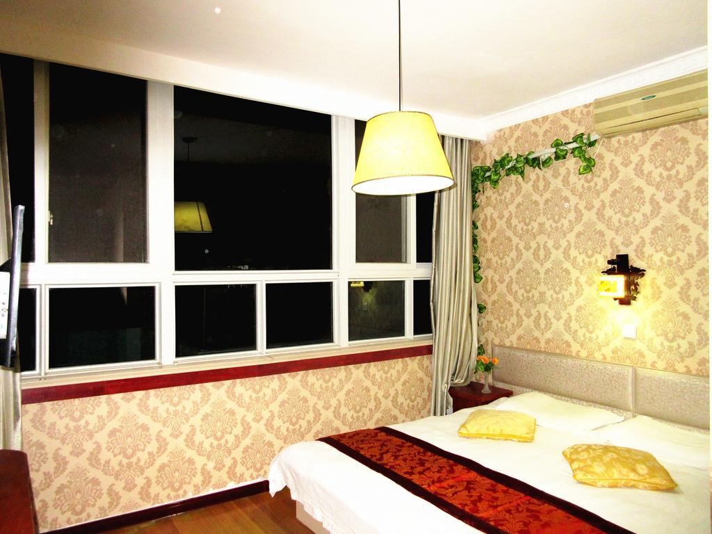 25°C Four Season Youth Hostel Qingdao Kamer foto