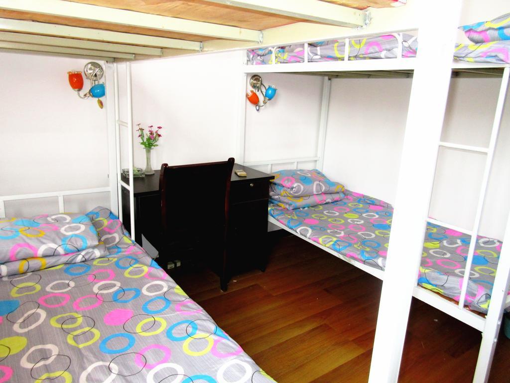 25°C Four Season Youth Hostel Qingdao Kamer foto