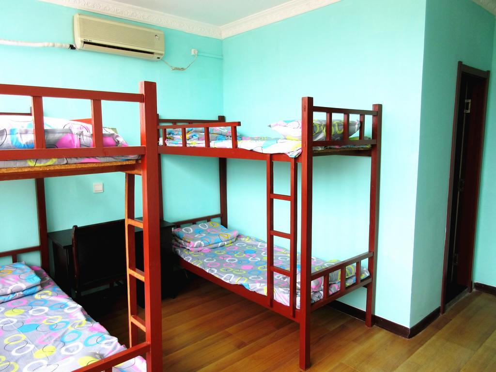 25°C Four Season Youth Hostel Qingdao Kamer foto