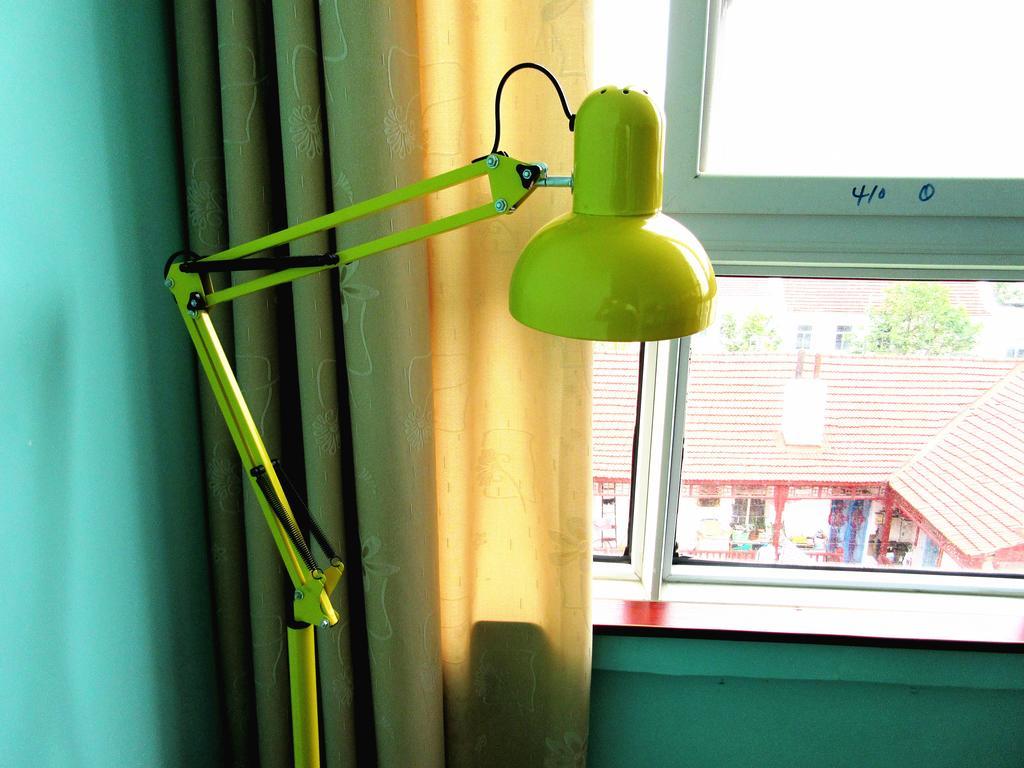 25°C Four Season Youth Hostel Qingdao Kamer foto